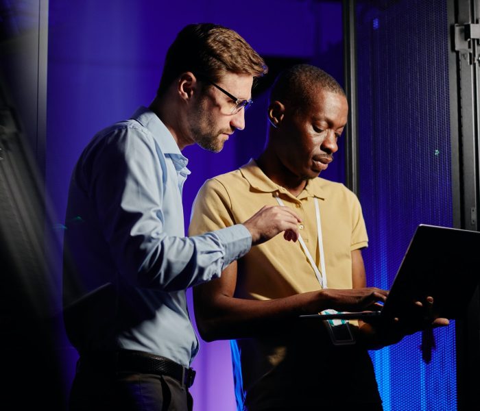 Network Technicians Using Laptop